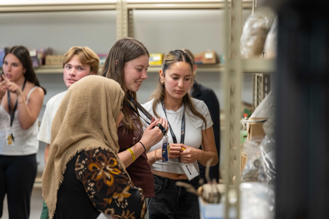 Students examining specimens with a guide